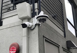 Security cameras installed on building